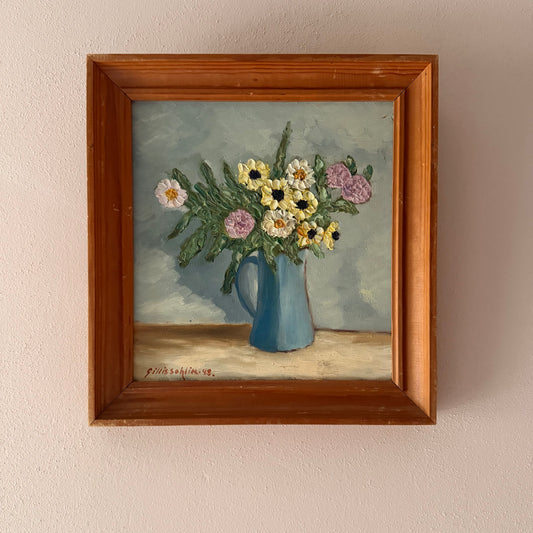 Flowers in Blue Pitcher